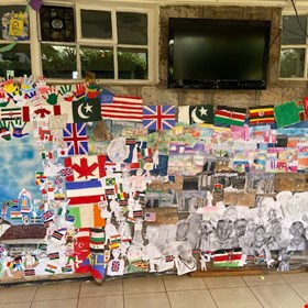 tribal portraits and Kenyan landscapes and kindness heroes and flags of our students countries