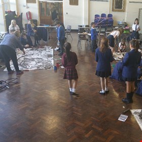 Local artist Jane Simpson worked with the students to create their giant STEAM pictures