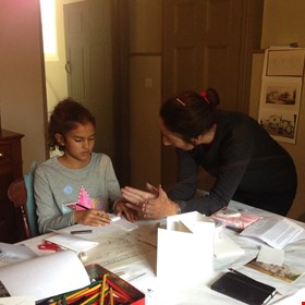 Artist Tahira Mandarino from Raw Ground Arts with budding young artist